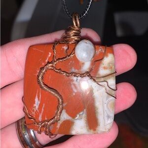 Wire wrapped jasper/moonstone tree of life jewelry.